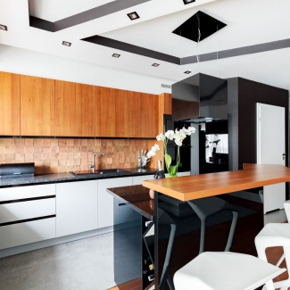 Kuchnia w salonie - apartament Kraków